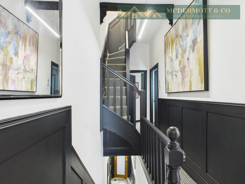 Stairs to first floor and Landing