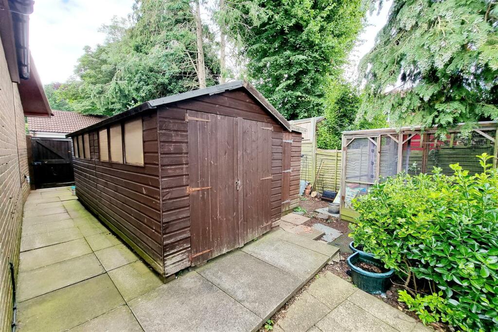 PLOT TO SIDE &amp; SHEDS: