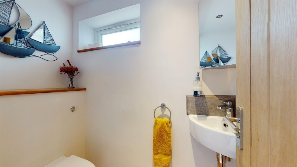 DOWNSTAIRS CLOAKROOM