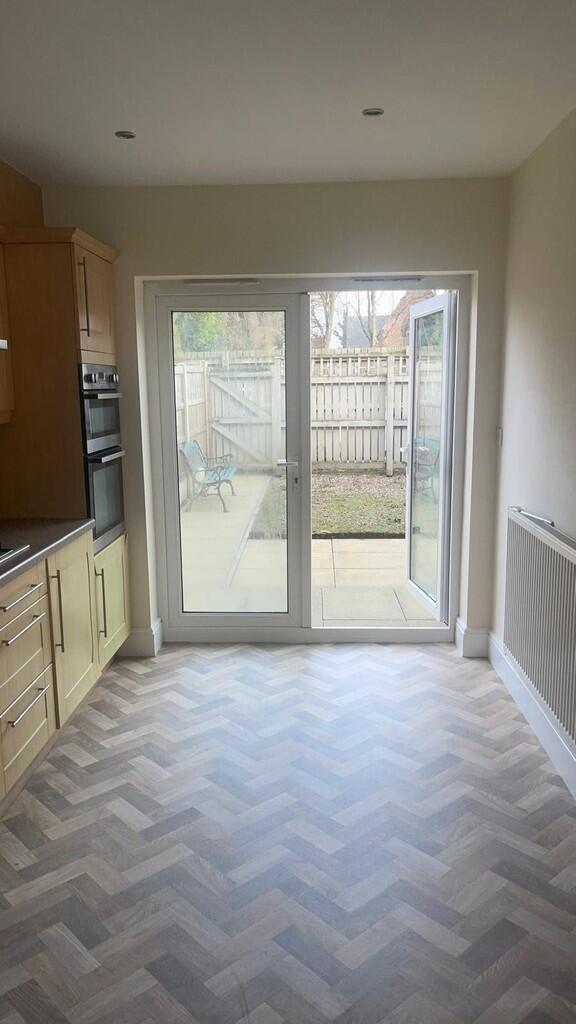 kitchen leading o...