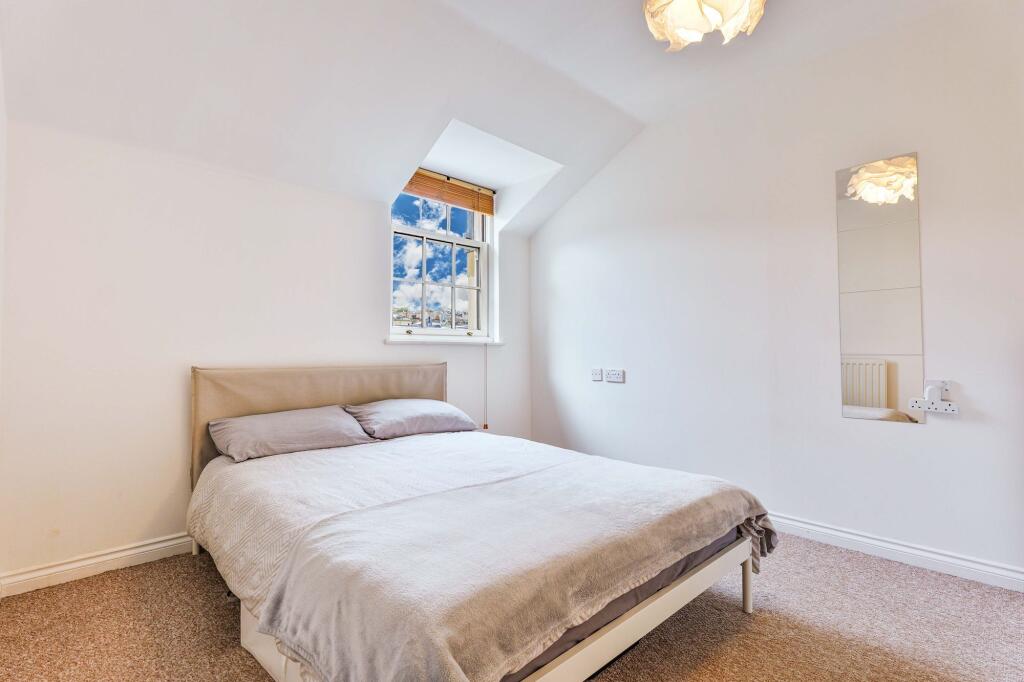 Generously-proportioned doubled bedroom. View to rear of property