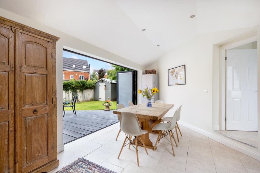 Dining Room With Bifold Doors