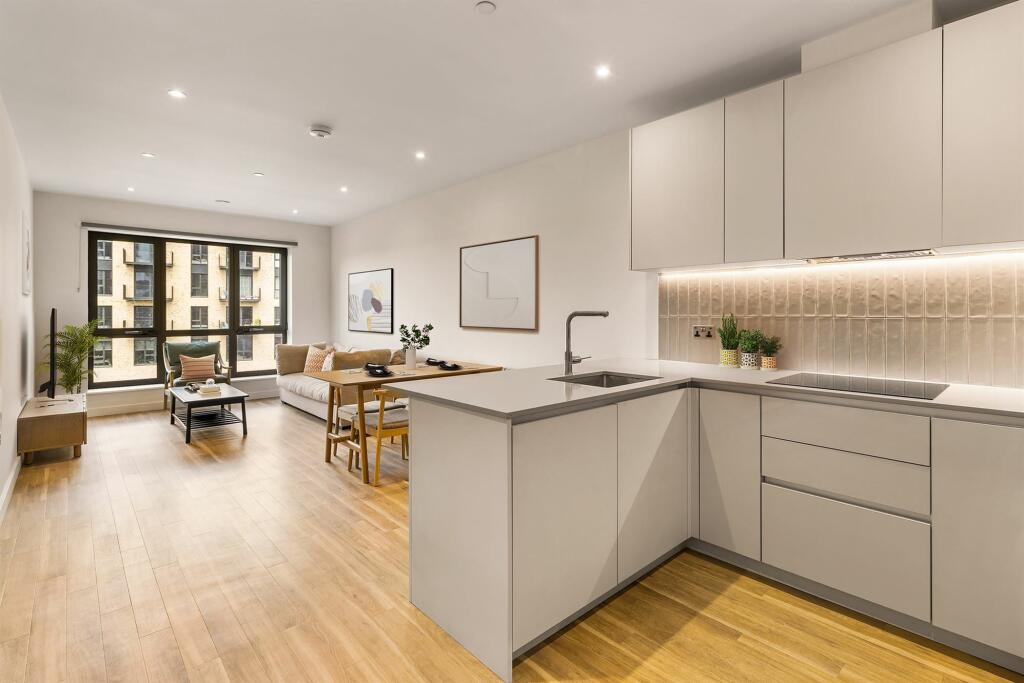 Experience the elegance of modern living with this stylish open-plan design.