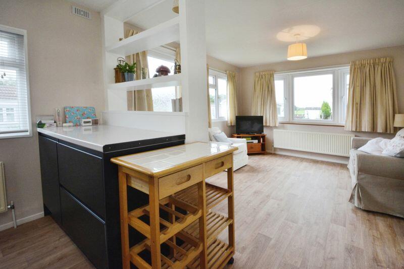 Kitchen through to the living room