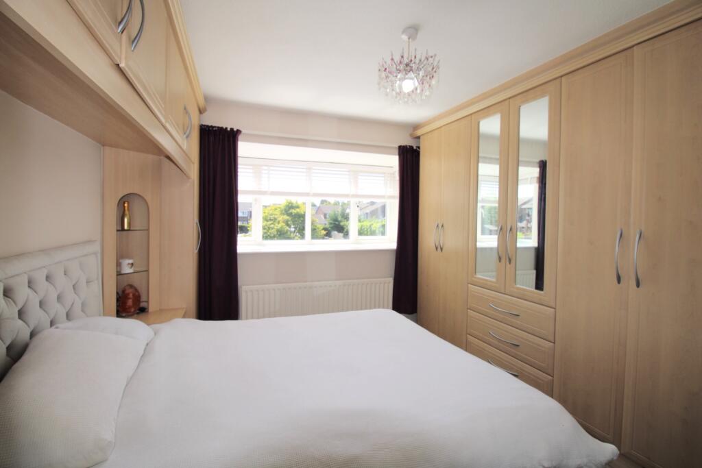 Bedroom two with fitted wardrobes