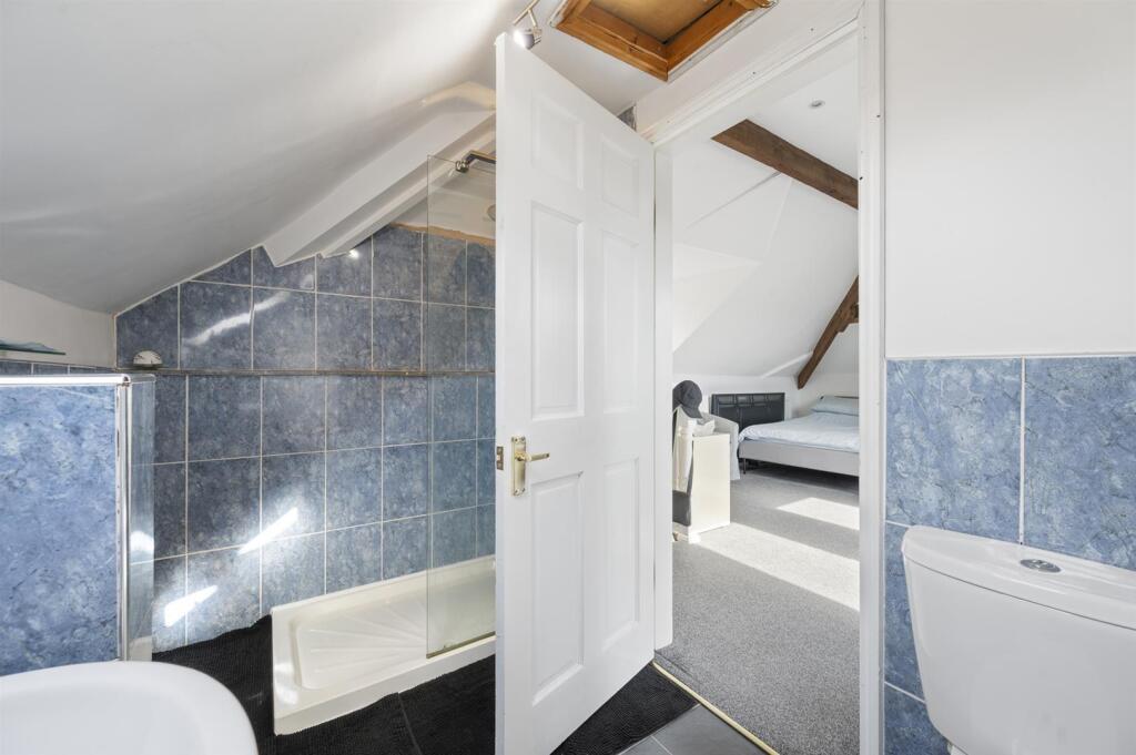 Bedroom Five - en-suite to shower.jpg