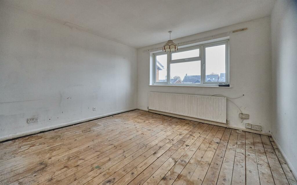 FRONT BEDROOM ONE