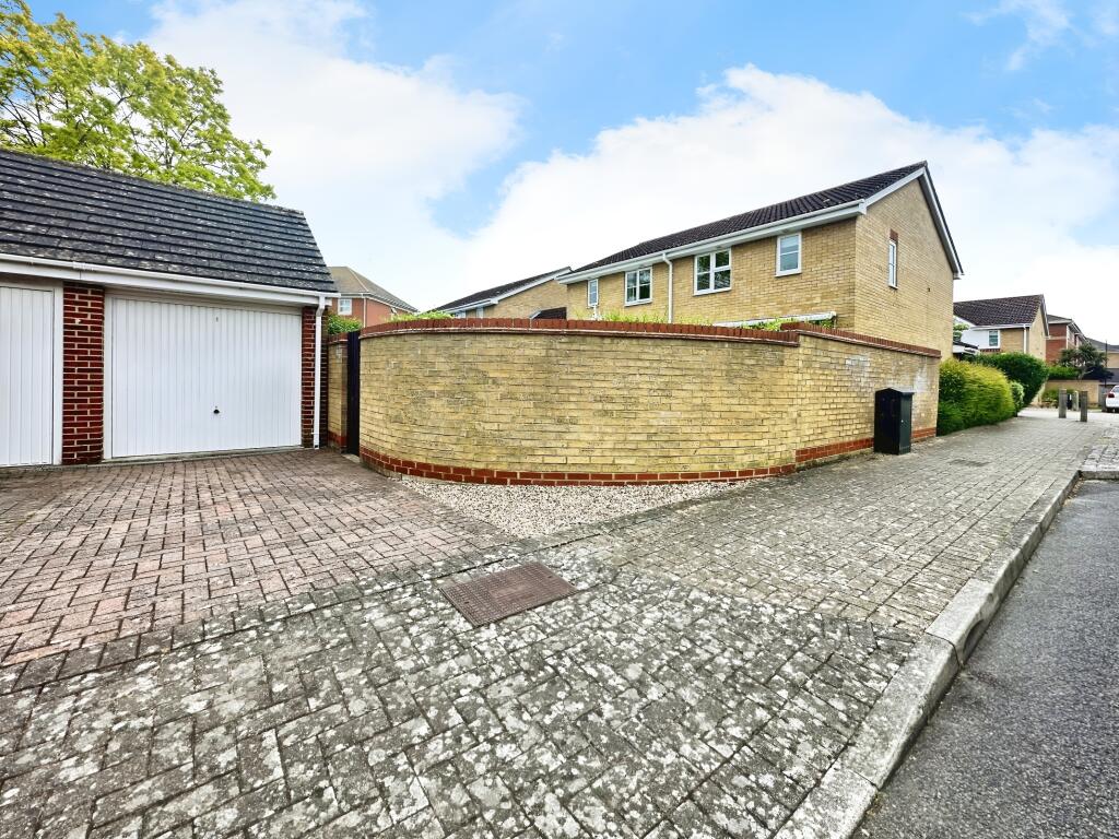 Garage and Driveway With Back Access View
