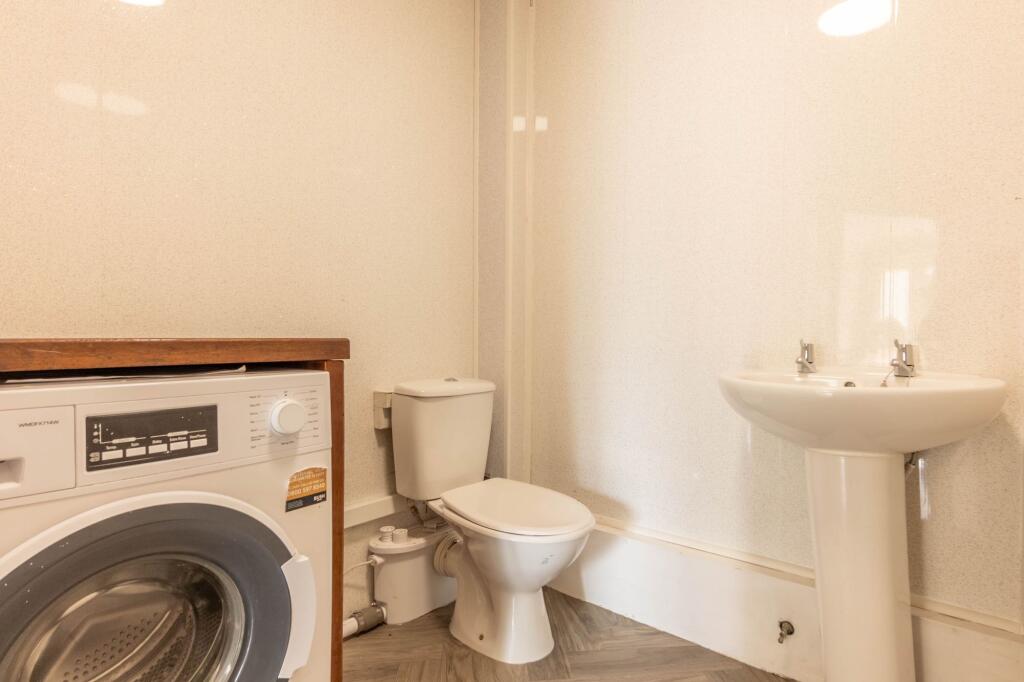 DOWNSTAIRS W.C./UTILITY