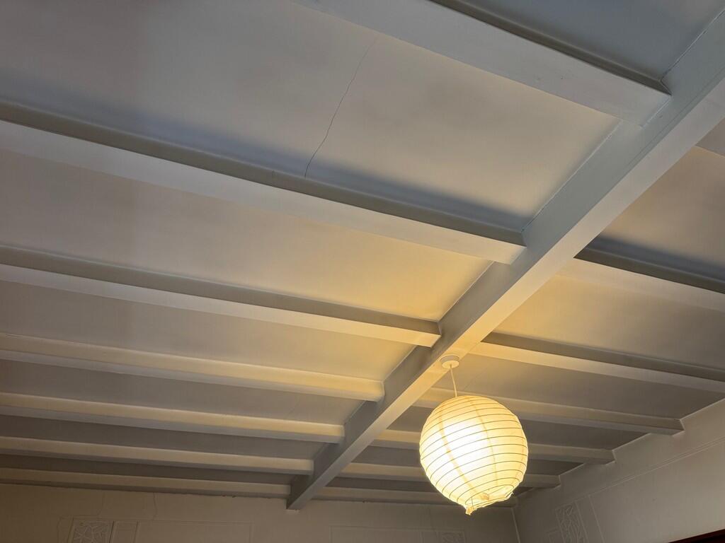 beamed ceiling in...