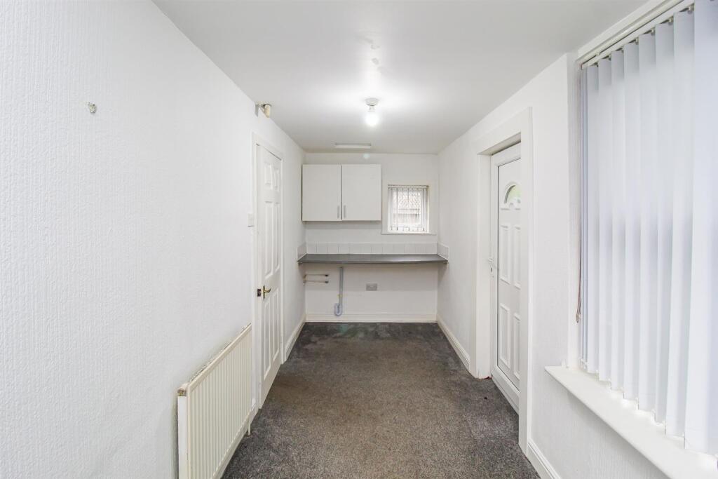 SUN ROOM/UTILITY ROOM