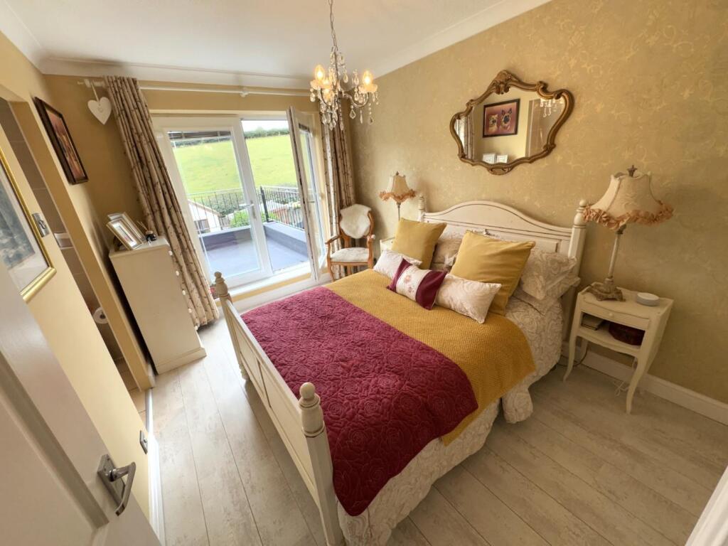 BEDROOM ( REAR)