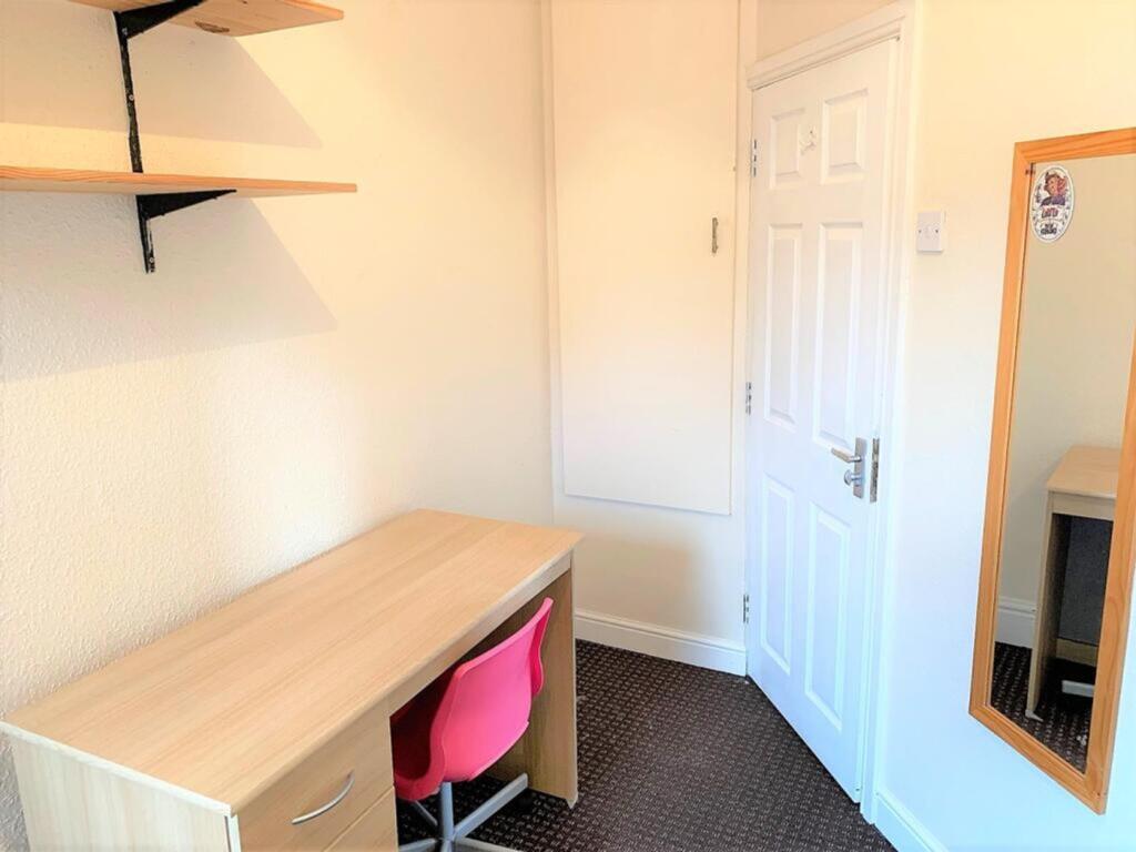 Bright and tidy workspace featuring a functiona...