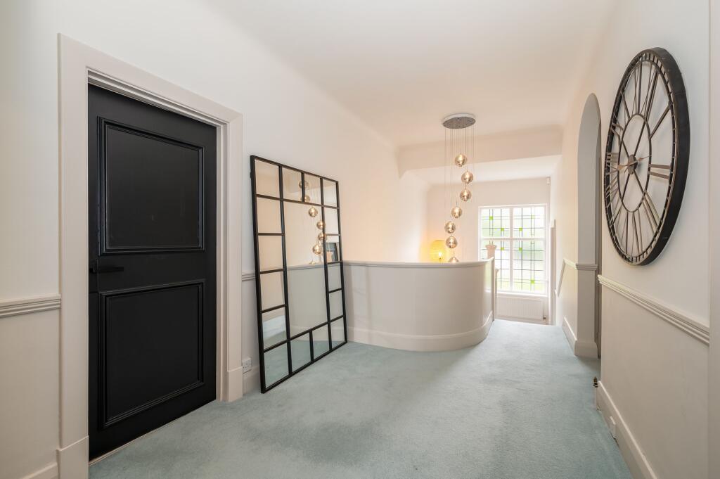 ENTRANCE HALLWAY AND LANDING