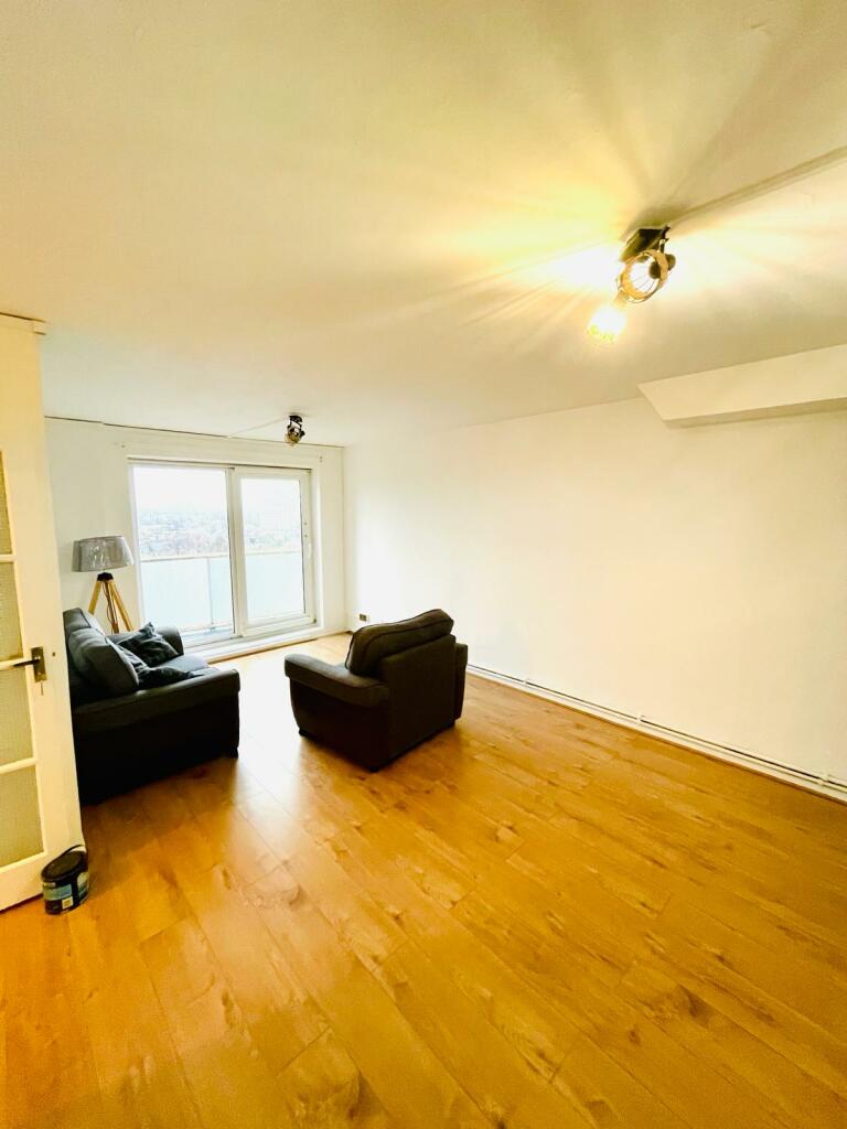 Spacious living room with balcony