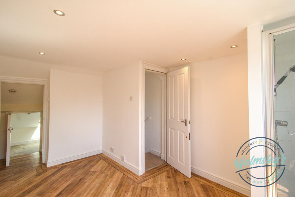 Loft room with shower cubicle and excellent storag