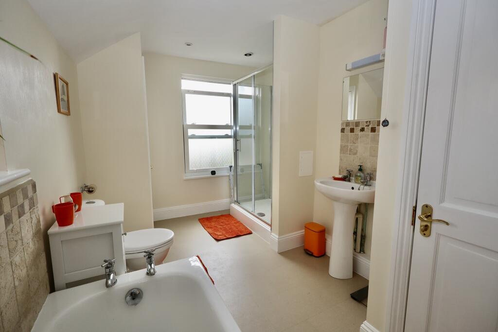 Bathroom with separate shower