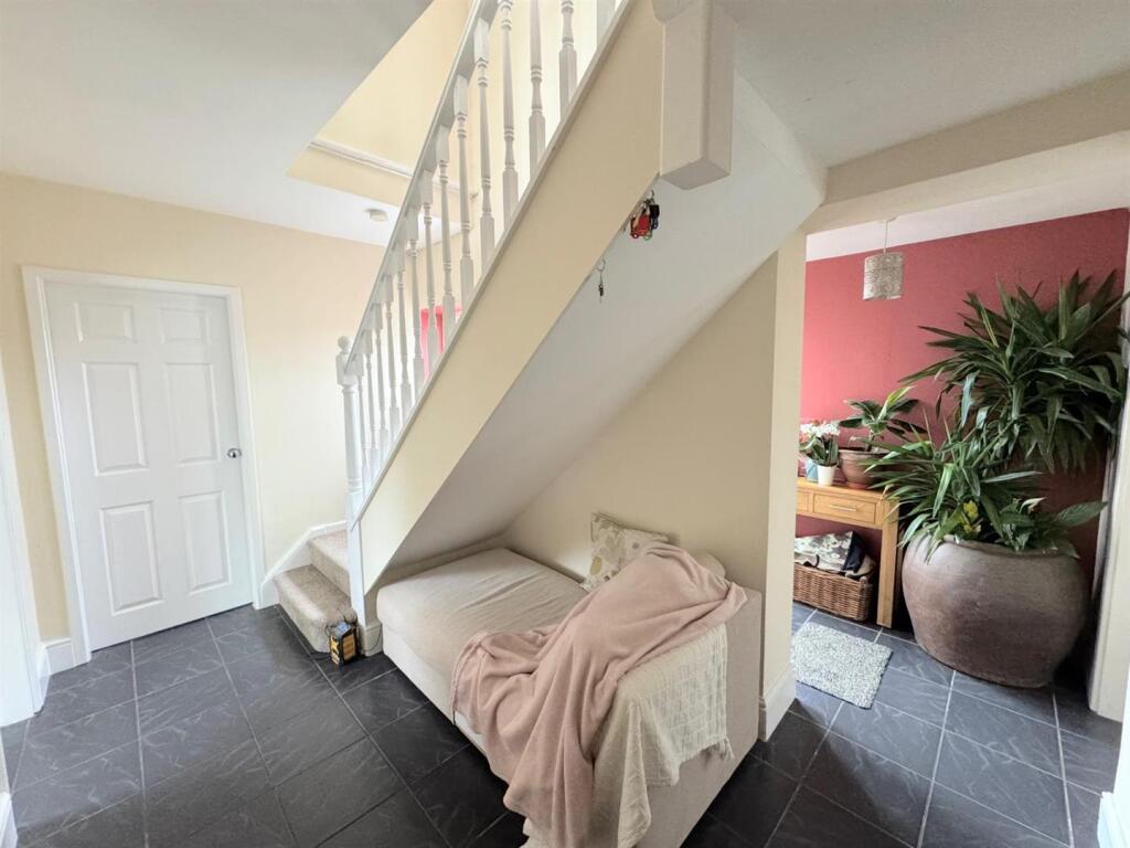 ENTRANCE HALLWAY AND PORCH