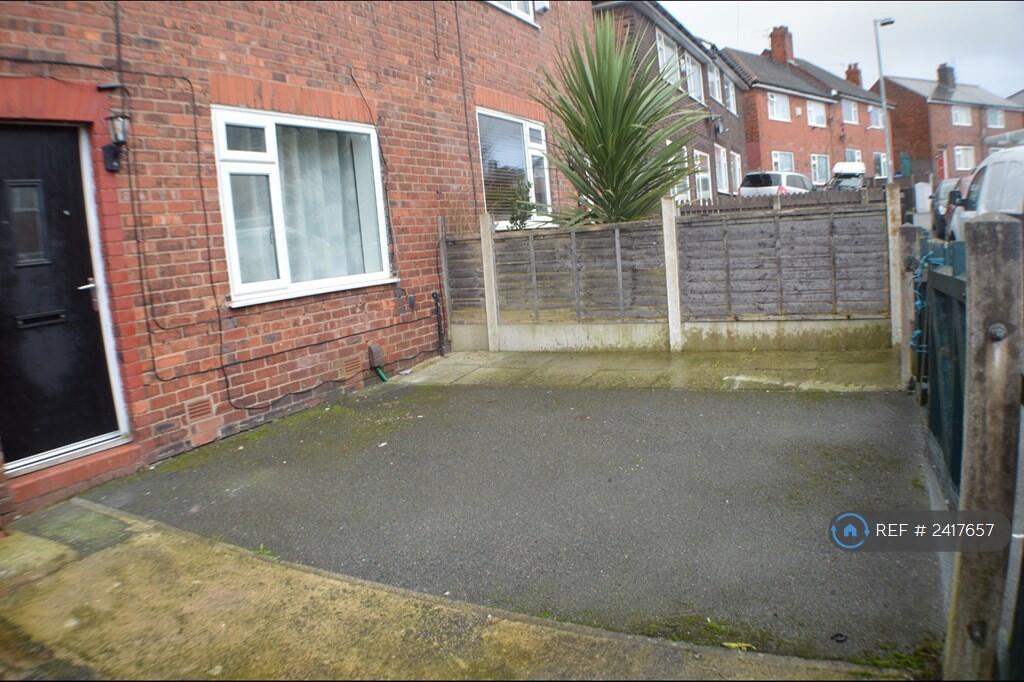 Front Garden With Private Driveway