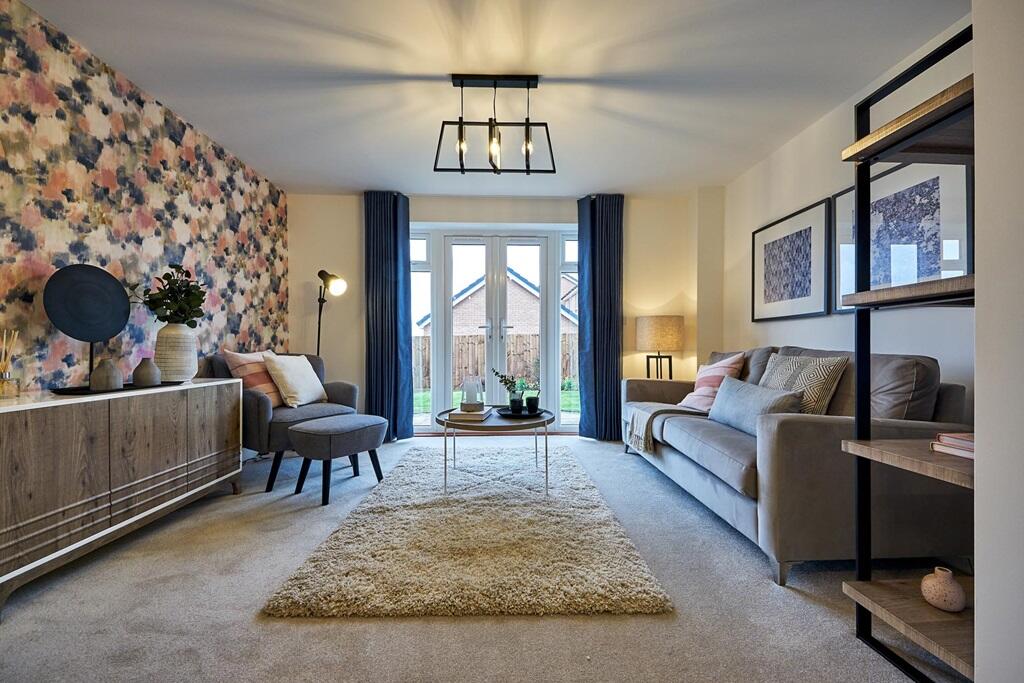 The spacious lounge with French doors