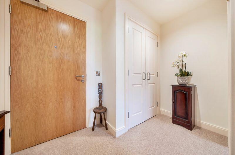 Entrance hall with storage cupboard