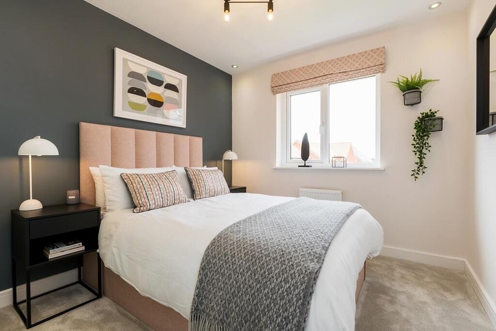 A spacious second double bedroom creating the perfect space to unwind