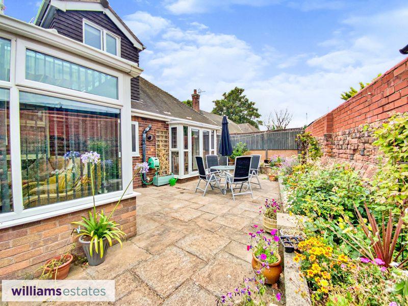 rear patio and flower bed