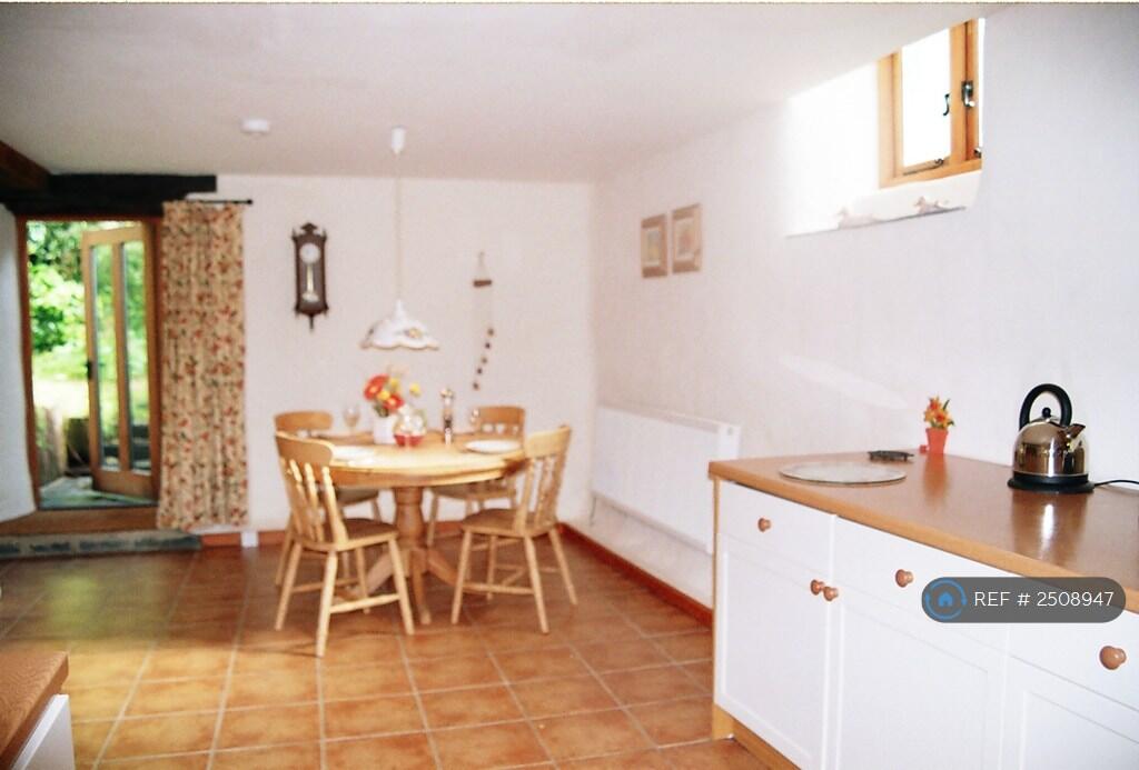 Dining Area Showing Door To Woodland