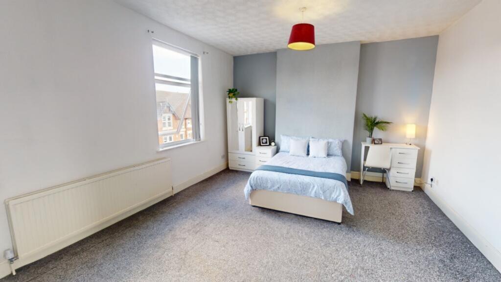 A spacious and bright large double bedroom, per...