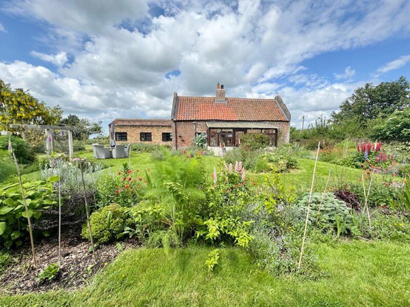 Formal gardens to house