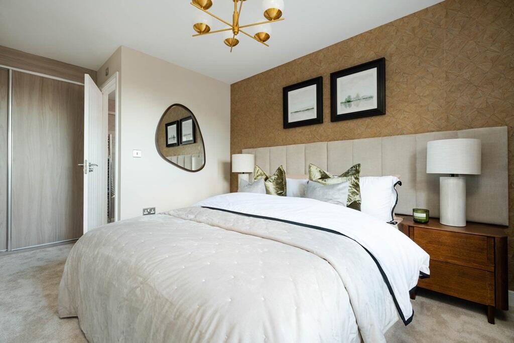 Bedroom 1 is complete with a private en-suite
