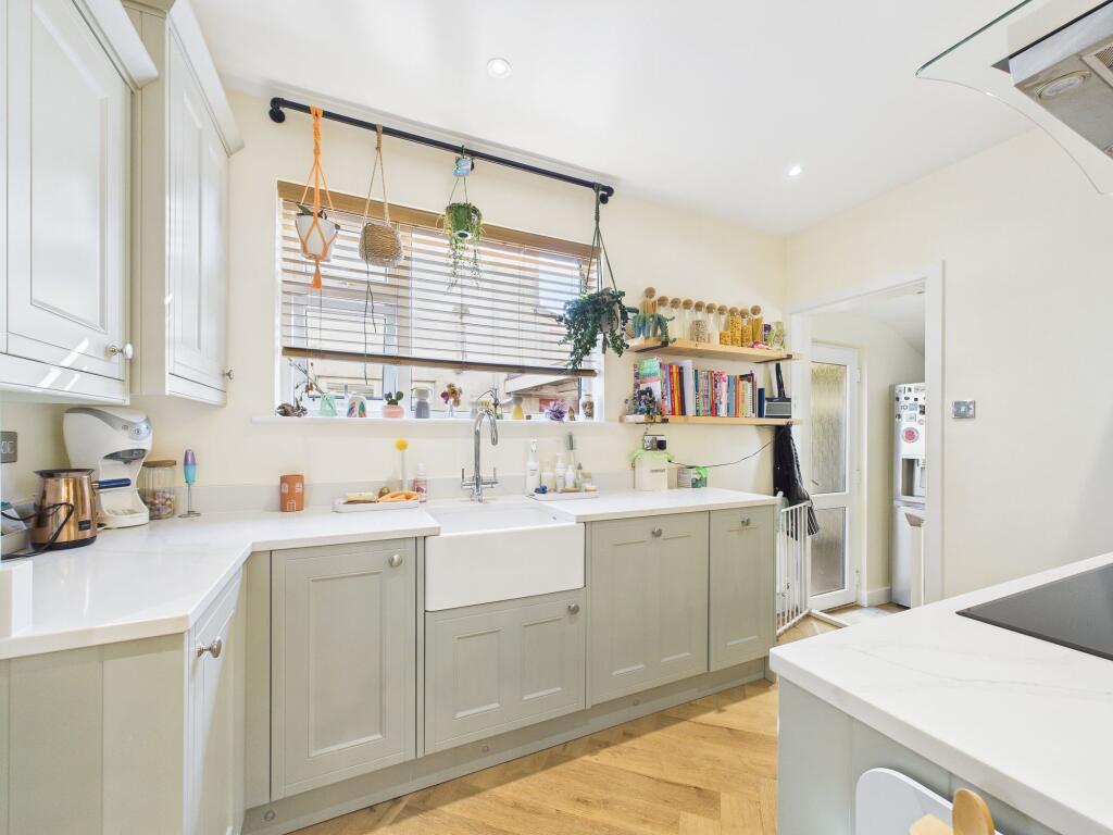 Kitchen leading into Utility