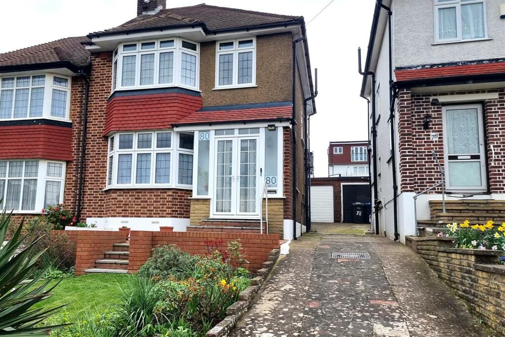 GARAGE WITH SHARED DRIVEWAY: