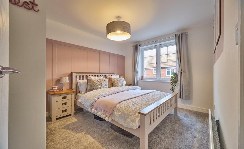 BEDROOM TWO TO FRONT