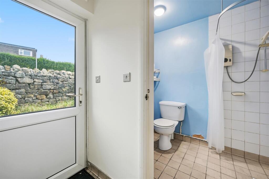 Shower Room and rear entrance door.jpg