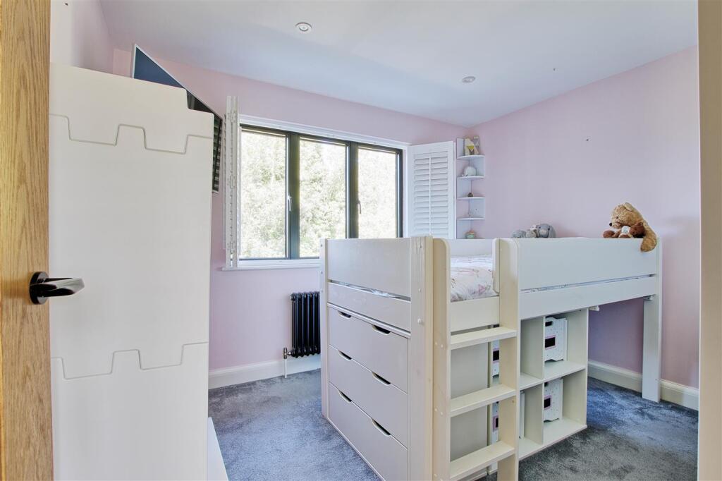 Bedroom three with shutters open.jpg