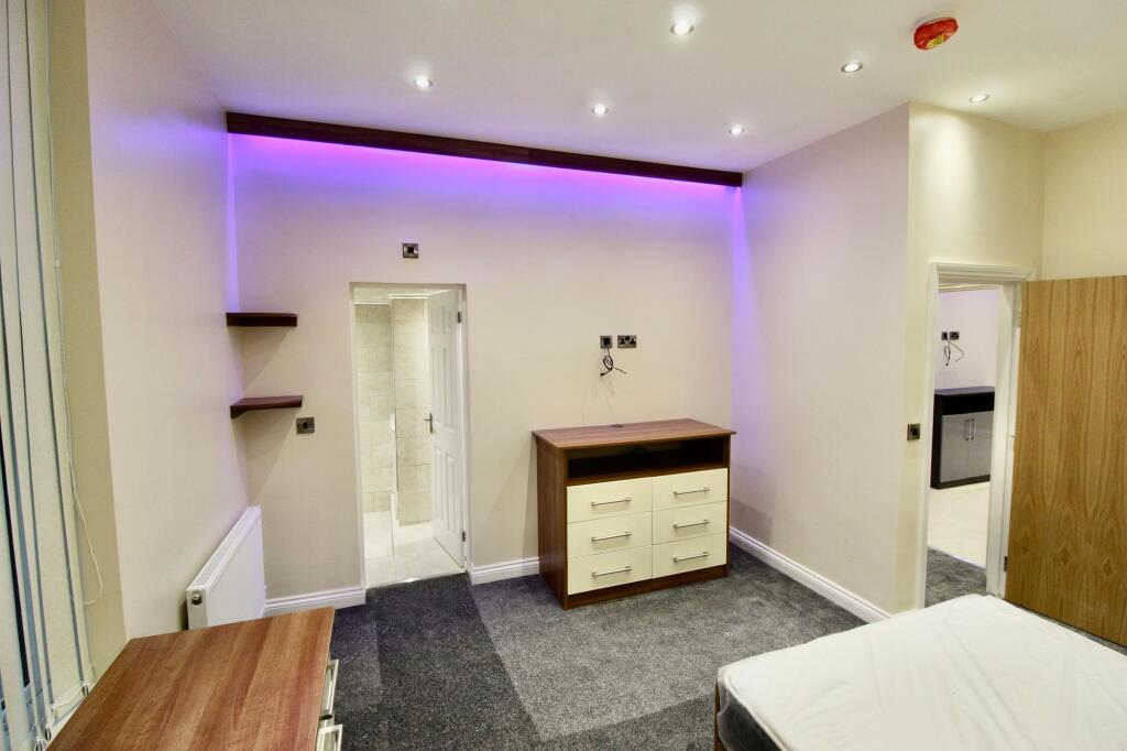 Modern and stylish living room featuring ambien...