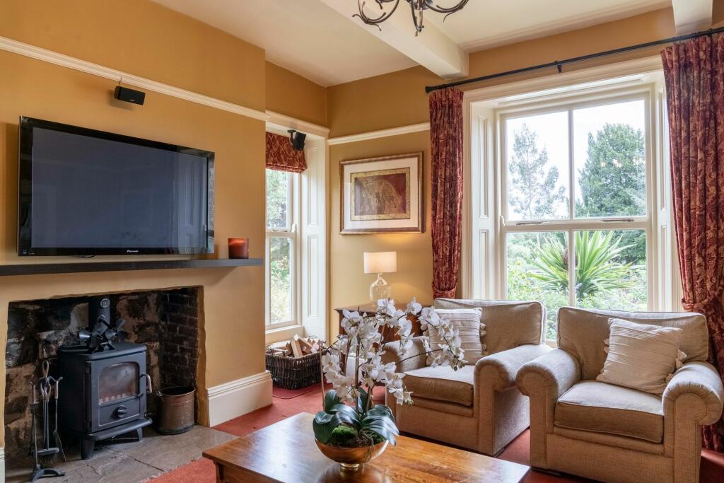 Cosy lounge with log burning stove