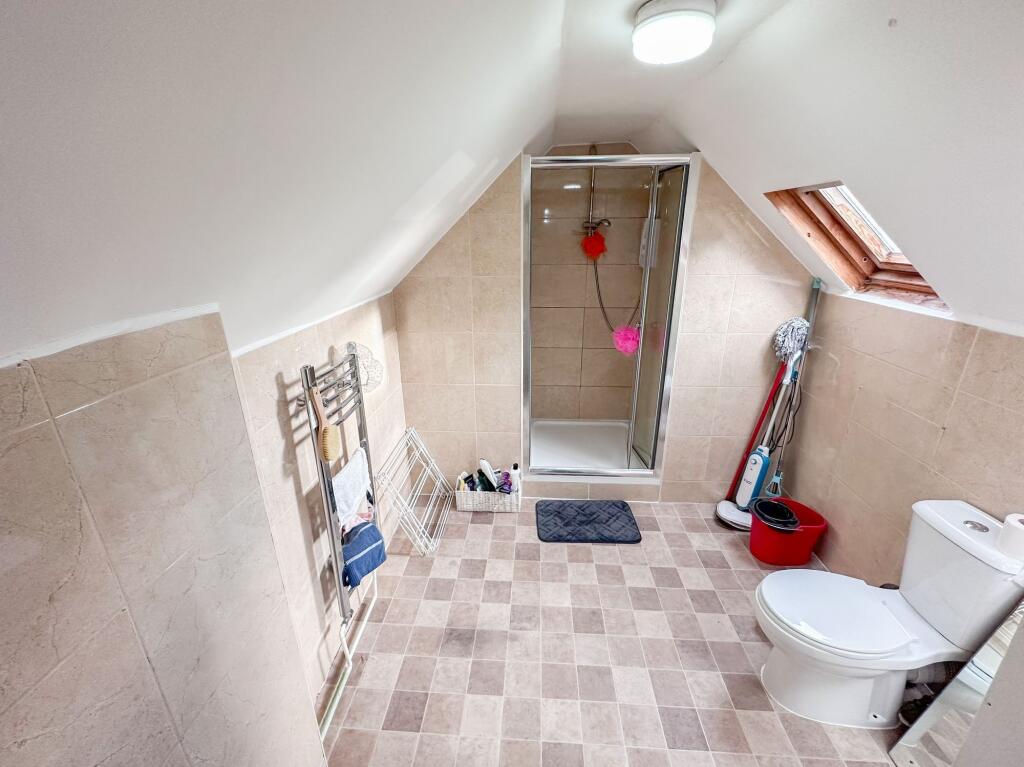 A bright and well-maintained bathroom featuring...
