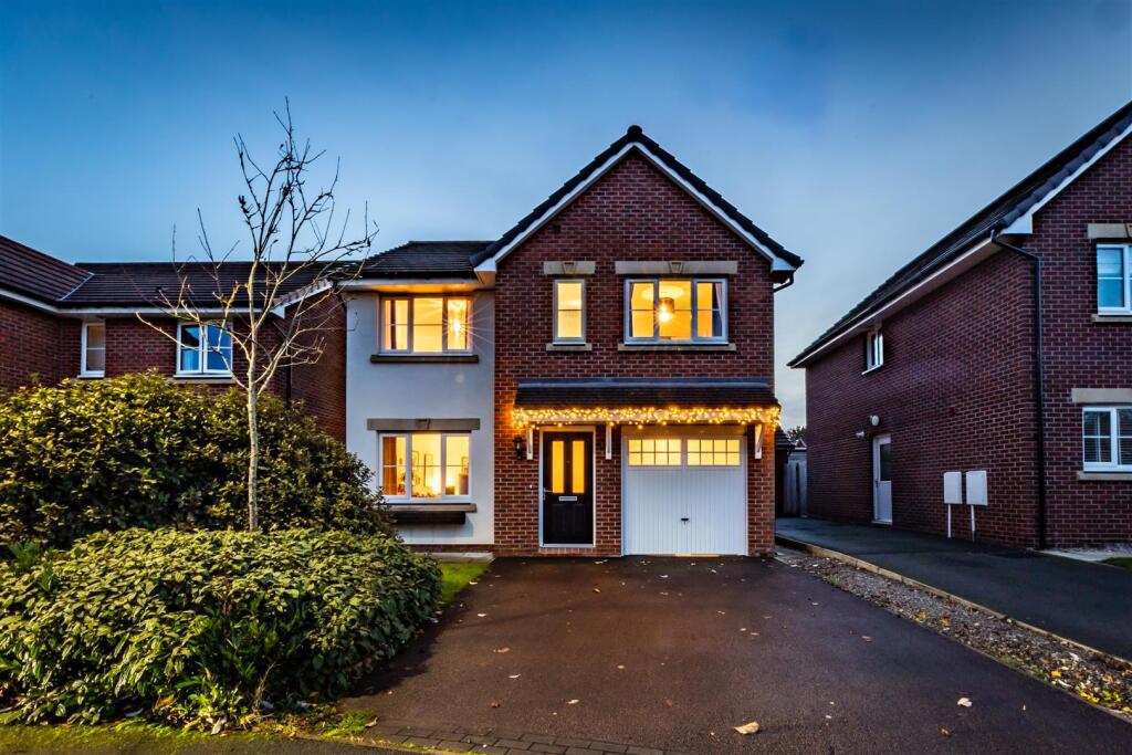 Impeccably styled, detached property in a prized contemporary development