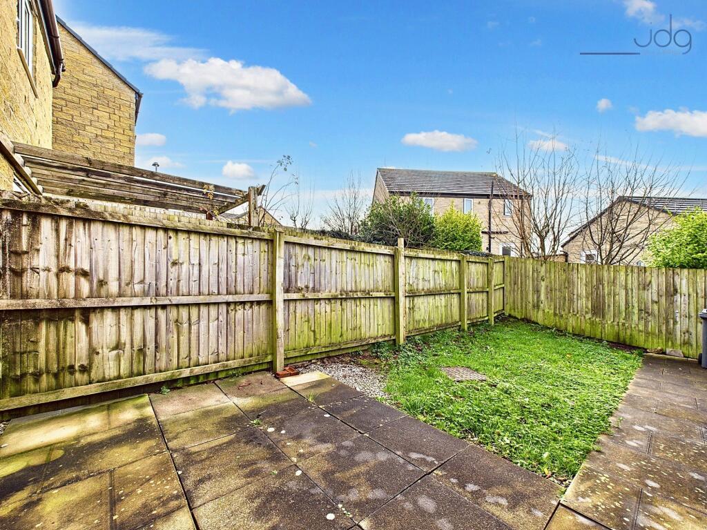 Spacious Garden with a mixture of lawn and flagged areas