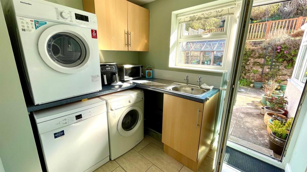 REAR PORCH/ UTILITY ROOM