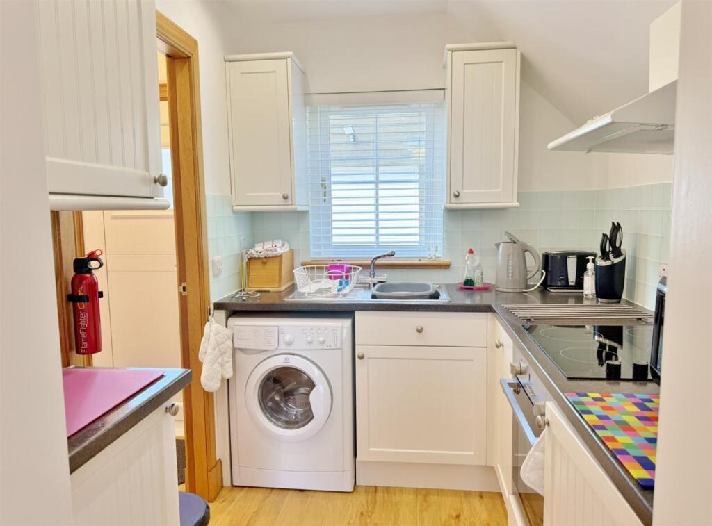 Little Wellingtonia kitchen from lounge area