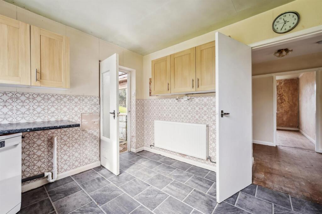 Kitchen towards hallway and workshop.jpg