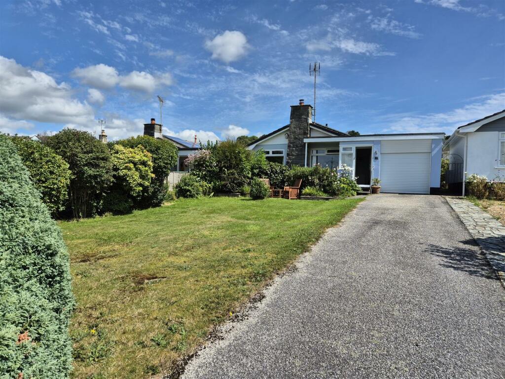 property with front garden and parking.jpg