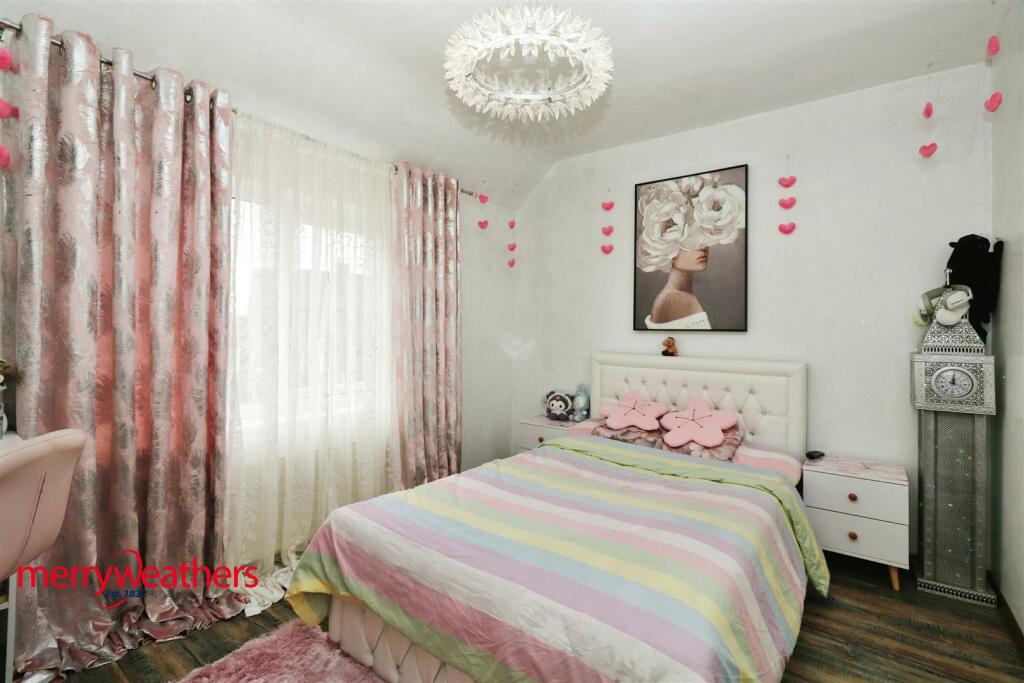 FRONT BEDROOM