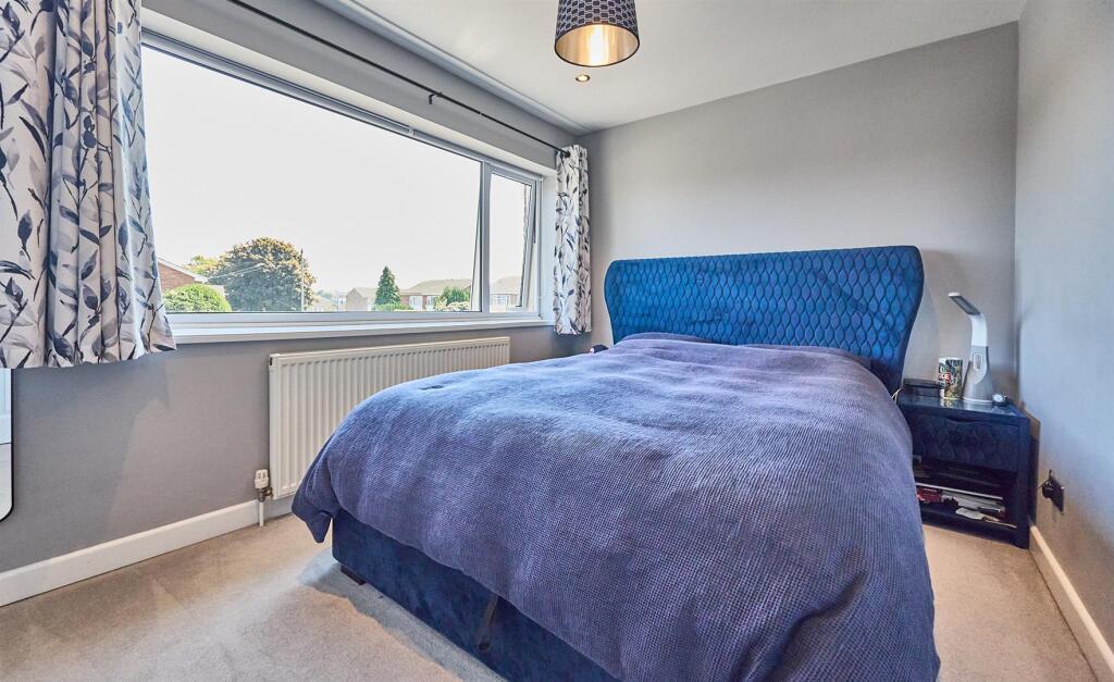 FRONT BEDROOM ONE