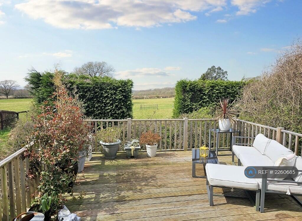 Decked Terrace At The End Of The Garden