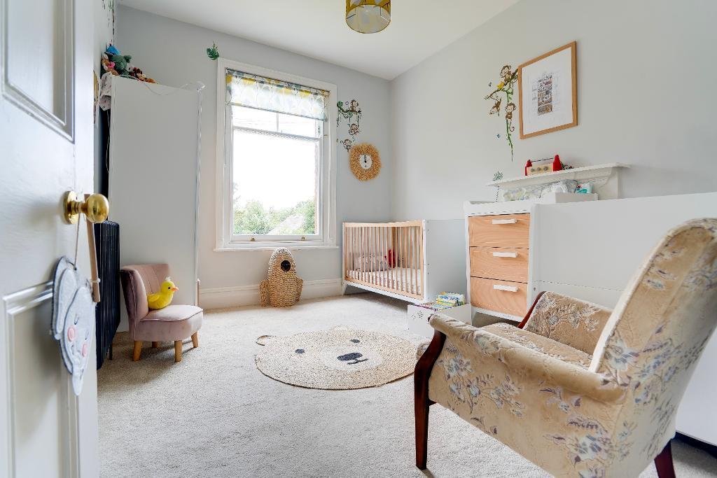Bedroom 3 with period fireplace