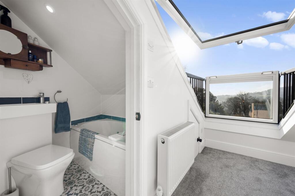 Bedroom Four - en-suite and cabrio window.jpg